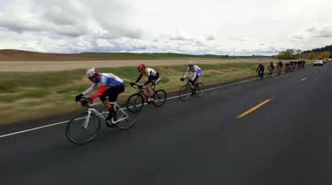 Group of cyclists on a road race Stock Footage 50452782