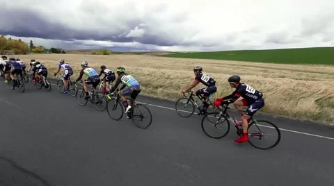 Group of cyclists on a road race Stock Footage 50452787
