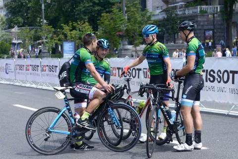 Group of cyclists standing in front of the start line Stock Photos