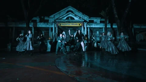 Group Dance Performance in front of Haunted House at Night Stock Footage 263014678