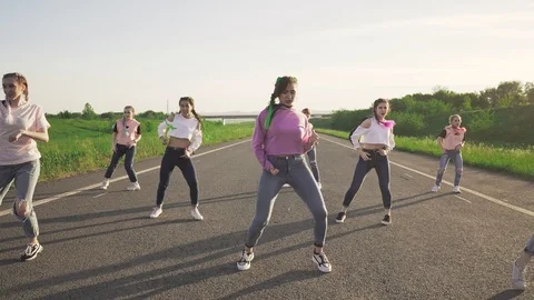 Group dancing hip-hop on road Stock Footage 111423972