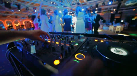 Group of dancing people in front of a dj Stock Footage 24755913