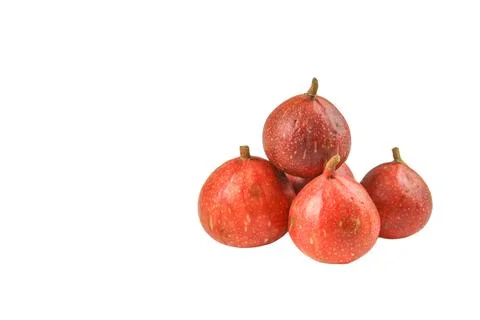 A group of dark red figs, some showing early signs of decay, cutout with cl.. Stock Photos