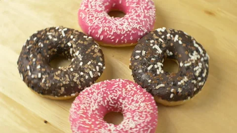 A group of delicious colored donuts Stock Footage 149480073