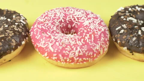 A group of delicious colored donuts Stock Footage 149480283