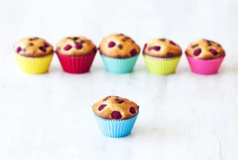 Group of delicious muffins placed on table Stock Photos