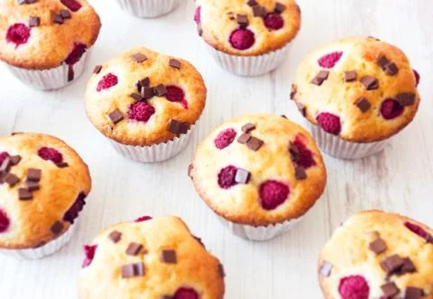 Group of delicious muffins placed on table Stock Photos
