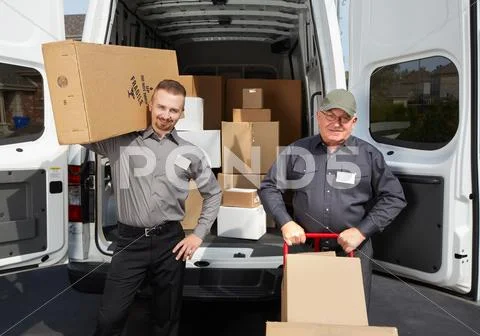 Group of delivery man with a parcel. Stock Photos