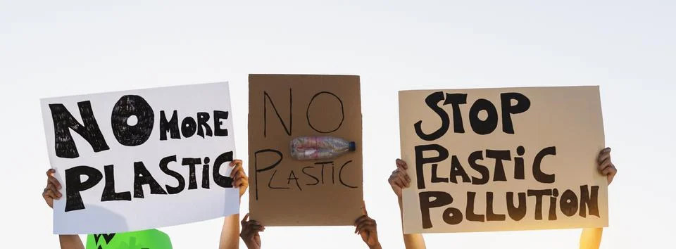 Group demonstrators protesting against plastic pollution and climate change Stock Photos