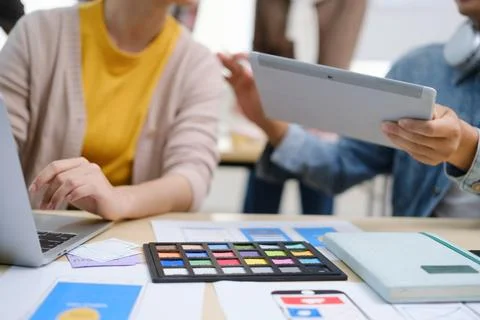 Group of developers working on new website wireframe, planning application Stock Photos