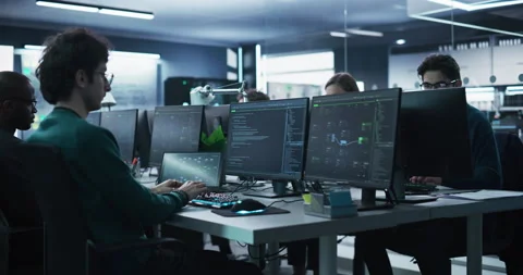 Group of Developers Working in Technology Center Video stock 233876573