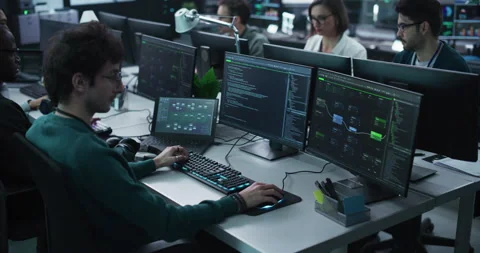 Group of Developers Working in Technology Center Stock Footage 233876796