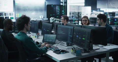 Group of Developers Working in Technology Center Video stock 233877123