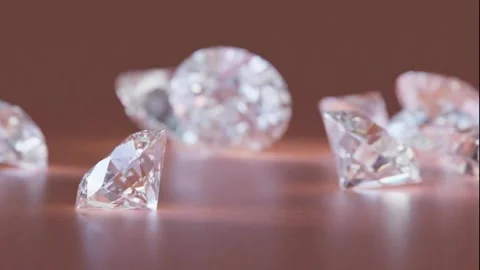 Group of diamonds falling on a studio background. 3d render animation. Stock Footage 272256248