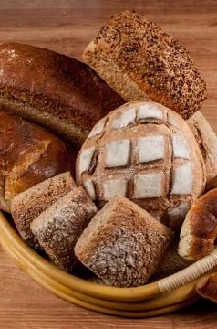 Group of different bread's type on wooden table Stock Photos