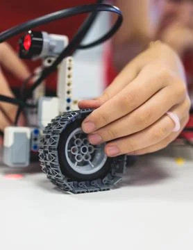 Group of diverse children kids with robotic vehicle model, close-up view on.. Stock Photos