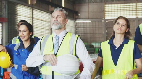 Group of diverse engineering and worker finished work and walking together,.. Stock Footage 242710229