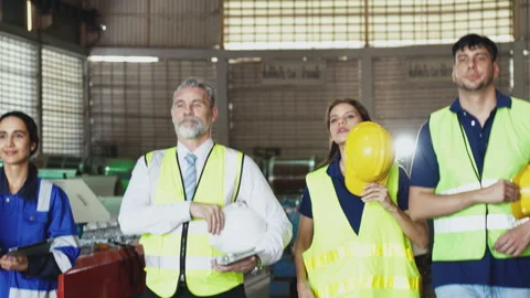 Group of diverse engineering and worker finished work and walking together,.. Stock Footage 242710493