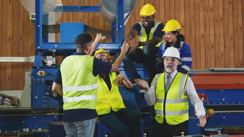 Group of diverse engineering and worker working together showing teamwork i.. Stock Footage 243973338