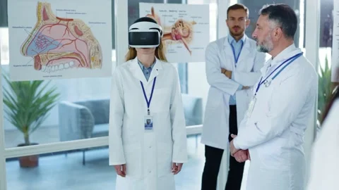 Group of diverse multi-ethnic workers applauding while testing new future Stock Footage 142847332