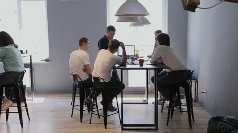Group of diverse people teamwork business meeting planning architect drawings Stock Footage