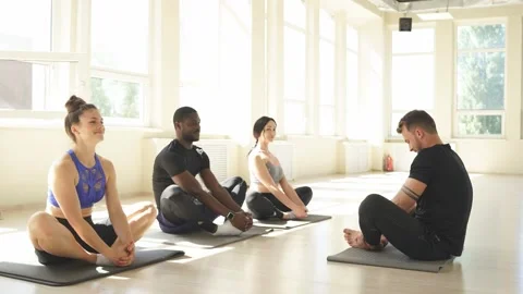 Group of diverse poople practicing yoga. Stock Footage 138317859