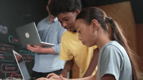 Group of diverse smart student working together to write program. Edification Stock Footage 276195256