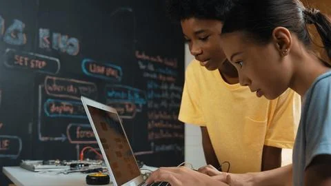 Group of diverse smart student working together to write program. Edification. Foto stock