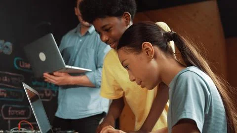 Group of diverse smart student working together to write program. Edification. Foto stock