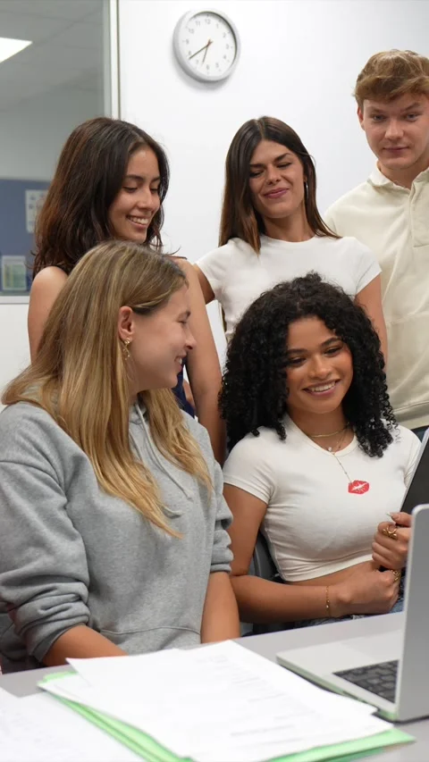 Group of diverse university students waving during video call Stock Footage 337036014