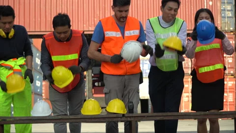 Group of diverse worker wearing safety helmet and walking to start work in th Stock Footage 139096045