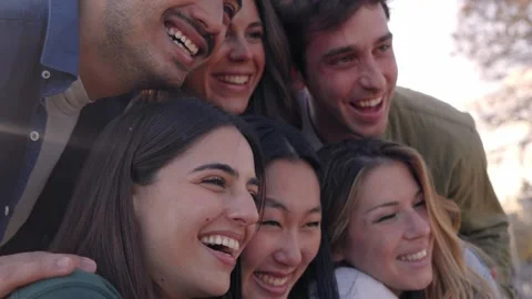 Group diverse young happy people excited having fun together outdoor. Friendship Stock Footage 273000656