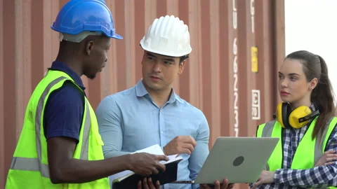 Group of diversity containers  worker discussion with laptop computer Checkin Stock Footage 154691748