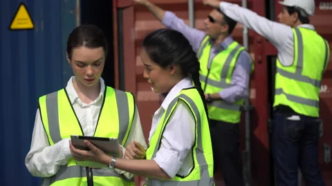 Group of diversity harbor worker discussion and using digital tablet checking Stock-Footage 154683124