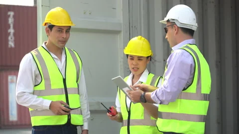 Group of diversity harbor worker discussion and using digital tablet checking Stock Footage 154692495