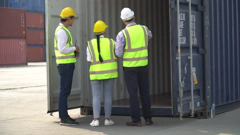 Group of diversity harbor worker discussion and using digital tablet checking Stock Footage 154693010