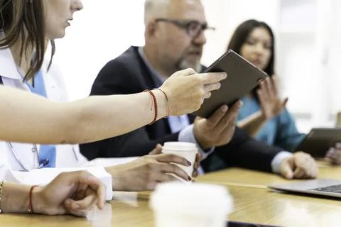 Group of doctors and nurses working together in a conference room at hospital Foto stock