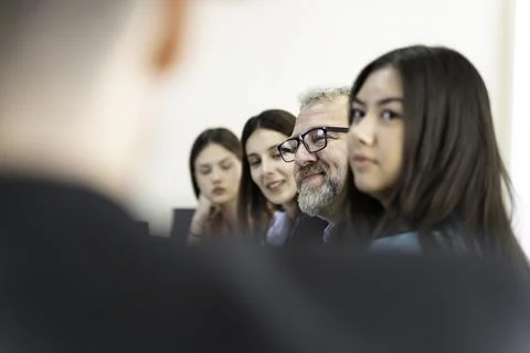 Group of doctors and nurses working together in a conference room at hospital Stock Photos
