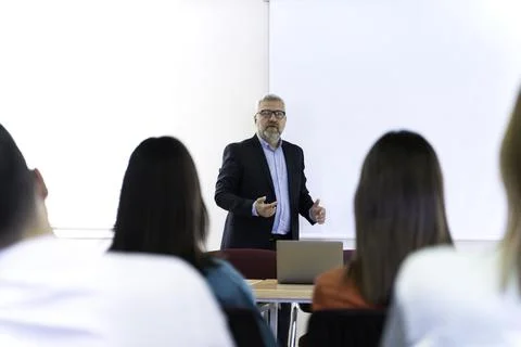 Group of doctors and nurses working together in a conference room at hospital Stock Photos