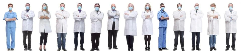 Group of doctors in mask isolated on white Foto stock
