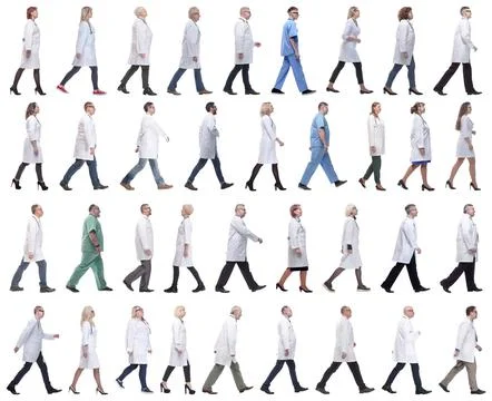 Group of doctors in motion isolated on white Foto stock