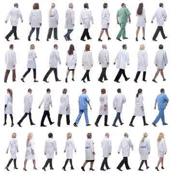 Group of doctors in motion isolated on white Foto stock