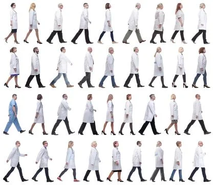 Group of doctors in motion isolated on white Foto stock