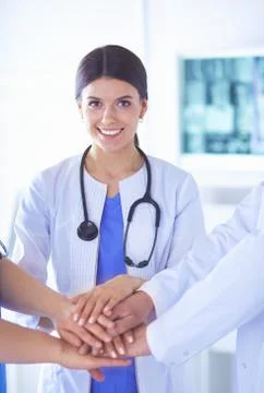 Group of doctors putting their hands together. Close-up Foto stock