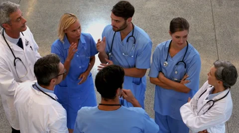 Group of doctors speaking together Stock-Footage 58525812