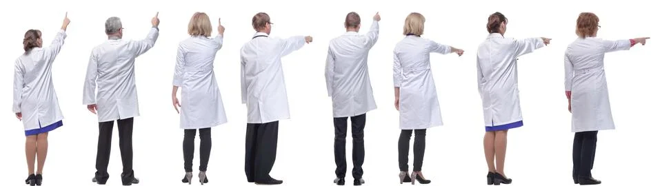 Group of doctors standing with their backs isolated Foto stock