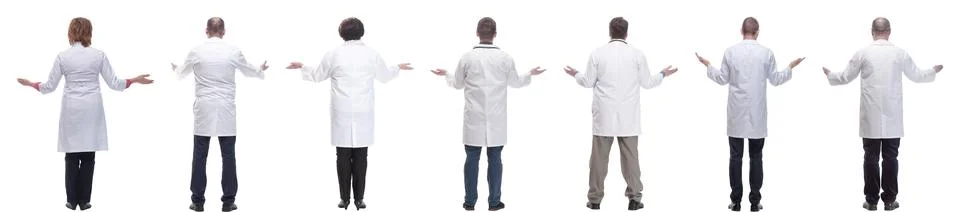 Group of doctors standing with their backs isolated 스톡 사진