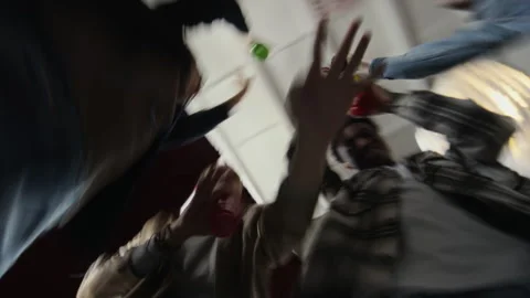 Group of Drunk Young People Partying and Dancing Stock Footage 323880640