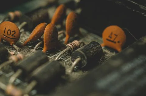 A group of dusty electronic components Stock Photos