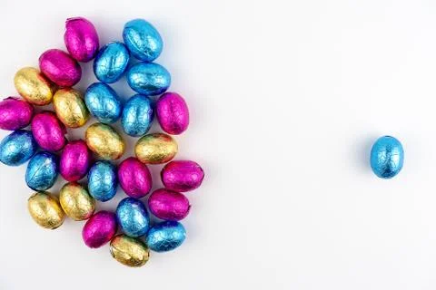 Group of easter eggs in blue, yellow and pink Stock Photos